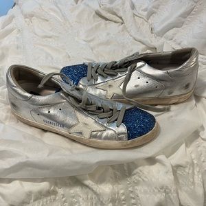 Barely worn Golden Goose superstar sneakers with blue sparkle front
